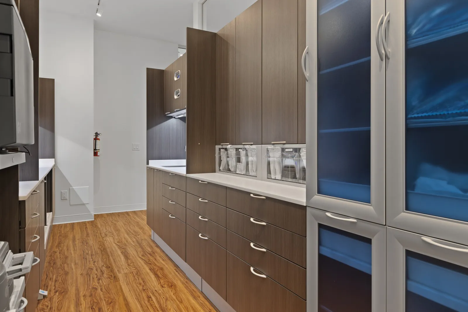 The Terry Fox sterilization room with blue-lit glass cabinets